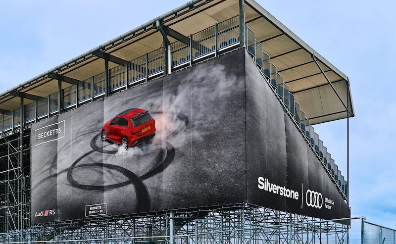 Premium printed mesh banners transform Silverstone grandstands into bold Audi branding